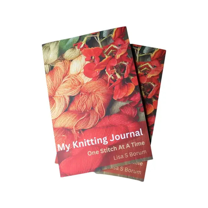 Two identical books titled My Knitting Journal: One Stitch At A Time by Lisa S Borum. The cover showcases a colorful array of yarn perfect for your projects, in shades of red, orange, and green, alongside vibrant red flowers.